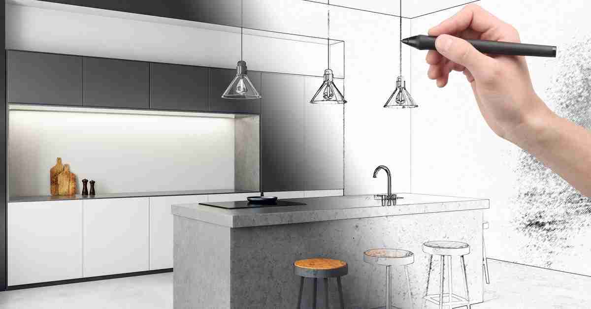 A kitchen layout with an island and overhead lights. Half the image is a sketch with a person holding a pen to it.